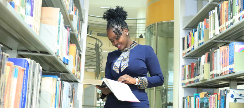 kca university student at the Martin Oduor Library